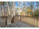 Wooden deck overlooks a wooded backyard at 204 Barbour Rd, Smithfield, NC 27577