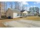 House exterior showcasing side view and landscaping at 204 Barbour Rd, Smithfield, NC 27577