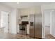 Stainless steel appliances and light-colored cabinetry at 204 Barbour Rd, Smithfield, NC 27577