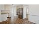 Kitchen boasts stainless steel appliances and tiled floor at 204 Barbour Rd, Smithfield, NC 27577