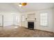 Spacious living room with fireplace and vaulted ceiling at 204 Barbour Rd, Smithfield, NC 27577