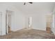 Main bedroom with carpet flooring and access to bathroom and closet at 204 Barbour Rd, Smithfield, NC 27577