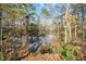 Peaceful pond view with trees at 204 Barbour Rd, Smithfield, NC 27577