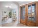 Bright entryway with a view into the home office at 45 Quail Pt, Pittsboro, NC 27312