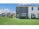 Private backyard with patio and green lawn at 454 Belgian Red Way, Wake Forest, NC 27587