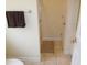 Bathroom with shower stall and tiled floor at 513 Port Dr, Henderson, NC 27537