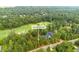 Aerial view of a vacant lot near a golf course at 684 Golfers Vw, Pittsboro, NC 27312