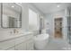 Luxurious bathroom with soaking tub, double vanity, and walk-in shower at 684 Golfers Vw, Pittsboro, NC 27312