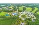 Aerial view of community with golf course and amenities at 684 Golfers Vw, Pittsboro, NC 27312