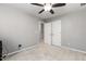 Well-lit bedroom featuring double doors and carpet at 722 Blue Lake Dr, Mebane, NC 27302