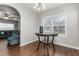 Cozy dining room with a round table and access to the living room at 722 Blue Lake Dr, Mebane, NC 27302