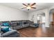 Relaxing living room with a large sectional sofa and ceiling fan at 722 Blue Lake Dr, Mebane, NC 27302