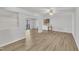 Finished basement with wood-look floors and access to patio at 101 Creekside Dr, Selma, NC 27576