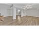 Finished basement showcasing hardwood floors and a ceiling fan at 101 Creekside Dr, Selma, NC 27576