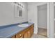 Clean bathroom with updated vanity and tiled floor at 101 Creekside Dr, Selma, NC 27576