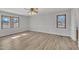 Spacious bedroom with hardwood floors and ceiling fan at 101 Creekside Dr, Selma, NC 27576