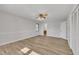 Bright bedroom with hardwood floors and ceiling fan at 101 Creekside Dr, Selma, NC 27576