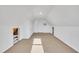 Attic bedroom with carpet, window, and closet at 101 Creekside Dr, Selma, NC 27576