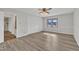 Bright bedroom with wood-look floors and ample closet space at 101 Creekside Dr, Selma, NC 27576