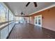 Large deck with ceiling fans and access to double doors at 101 Creekside Dr, Selma, NC 27576