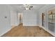 Dining room with hardwood floors and access to deck at 101 Creekside Dr, Selma, NC 27576