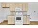 Kitchen with light wood cabinets and appliances at 101 Creekside Dr, Selma, NC 27576