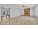 Living room with tile floors and view of deck at 101 Creekside Dr, Selma, NC 27576