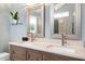 Double vanity with marble countertop and modern faucets at 103 Lakeleaf Ct, Cary, NC 27518