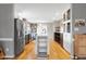 Modern kitchen with stainless steel appliances and white quartz countertops at 103 Lakeleaf Ct, Cary, NC 27518