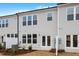 Private backyard with patio, landscaping, and AC unit at 1042 Westerland Way # 213, Durham, NC 27703