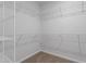 Large walk-in closet with wire shelving at 1042 Westerland Way # 213, Durham, NC 27703
