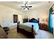 Bedroom with a double bed, ceiling fan, and dresser at 1205 Red Ash Cir, Durham, NC 27704