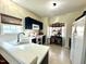 Kitchen with white countertops, dark blue cabinets, and appliances at 1205 Red Ash Cir, Durham, NC 27704