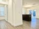 Kitchen island, dark brown cabinets, and granite countertops at 121 Blackthorn Ln, Angier, NC 27501