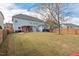 Spacious backyard with grassy area, and pergola at 125 Windrush Ln, Durham, NC 27703