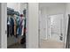 Large walk-in closet with ample shelving and hanging space at 125 Windrush Ln, Durham, NC 27703