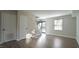 Simple entryway with stairs, hardwood floors and a door at 141 Jones Franklin Rd # G, Raleigh, NC 27606