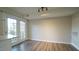 Spacious living room with hardwood floors and lots of natural light at 141 Jones Franklin Rd # G, Raleigh, NC 27606