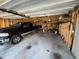 Interior view of two-car garage, showing storage and a vehicle at 2316 Blue Crab Ct, Wake Forest, NC 27587