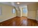 Well-lit bedroom with hardwood floors and dormer windows at 316 Tenney Cir, Chapel Hill, NC 27514