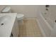 Clean bathroom with toilet, sink, and bathtub at 346 Kilarney Dr, Durham, NC 27703