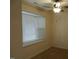 Bedroom with bay window, blinds, ceiling fan, and carpet at 346 Kilarney Dr, Durham, NC 27703