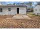 Home features a small patio and grassy backyard at 409 Avery Street St, Garner, NC 27529