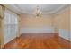 Formal dining room with hardwood floors and chandelier at 4911 Stockton Way, Durham, NC 27707