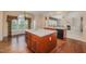 Kitchen with an island and hardwood floors at 4911 Stockton Way, Durham, NC 27707