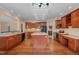 Large kitchen with island and ample cabinetry at 4911 Stockton Way, Durham, NC 27707