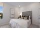 Cozy bedroom with window and neutral decor at 502 Winter Wren Ln, Durham, NC 27703