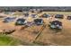 Aerial view showcasing a community of upscale homes with spacious lots at 68 Jeans Way, Benson, NC 27504