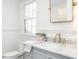 Bathroom with marble vanity and gold fixtures at 808 W Willowbrook Dr, Burlington, NC 27215