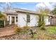 White house exterior with a deck and a play structure at 100 E Rockway St, Durham, NC 27704